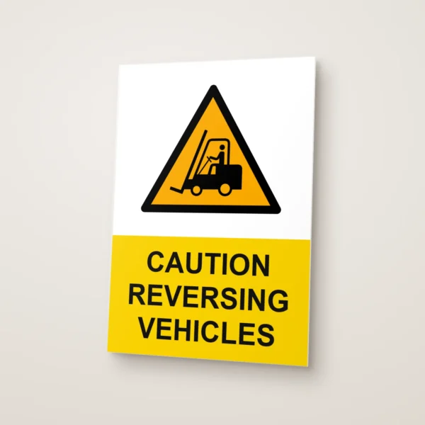 Caution Reversing Vehicles Sign